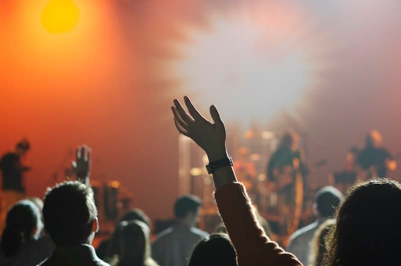 Diverse church community gathered in worship